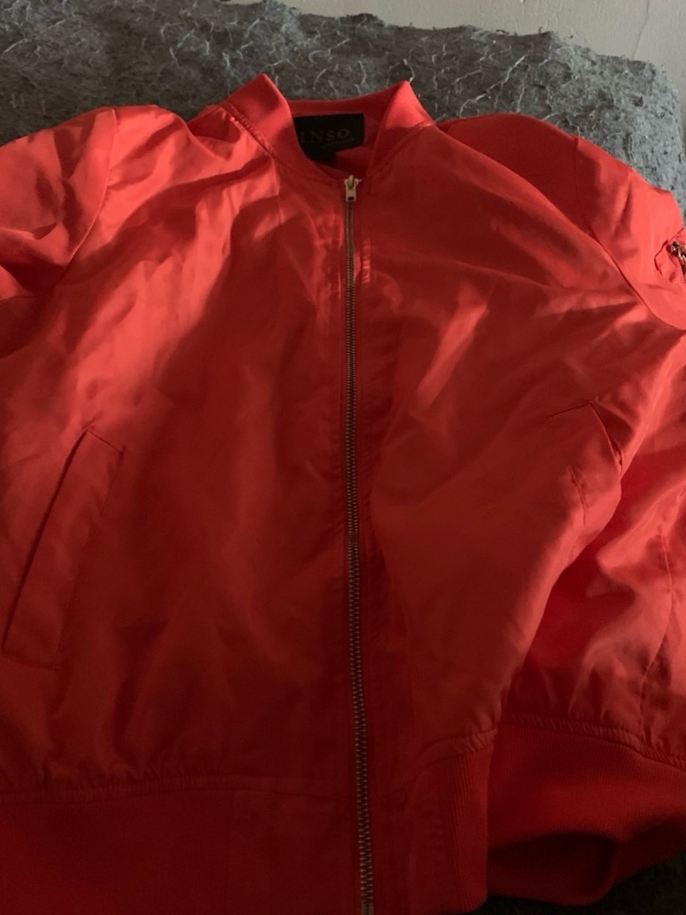 Orange bomber jacket
